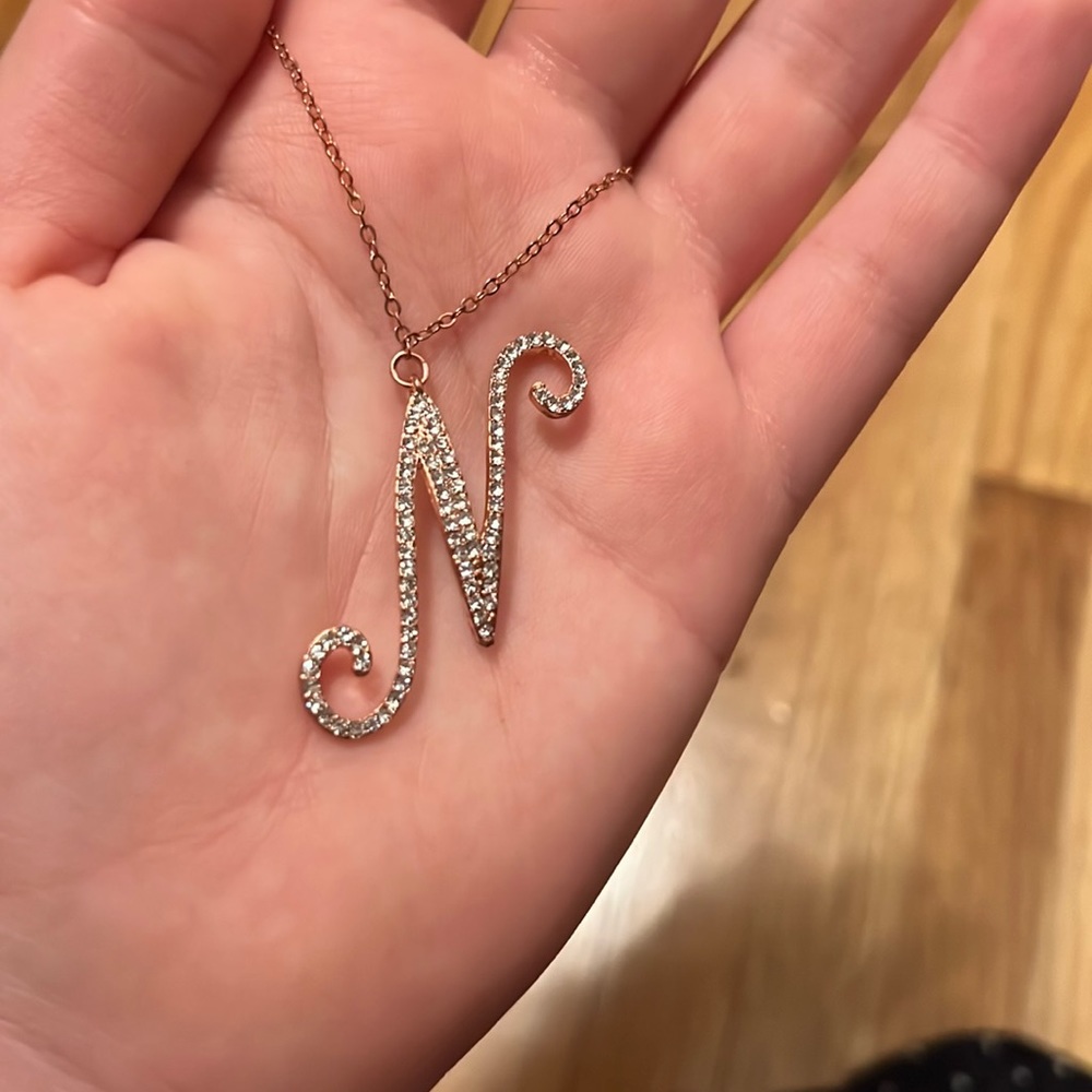 “N” initial necklace in rose gold and diamonds